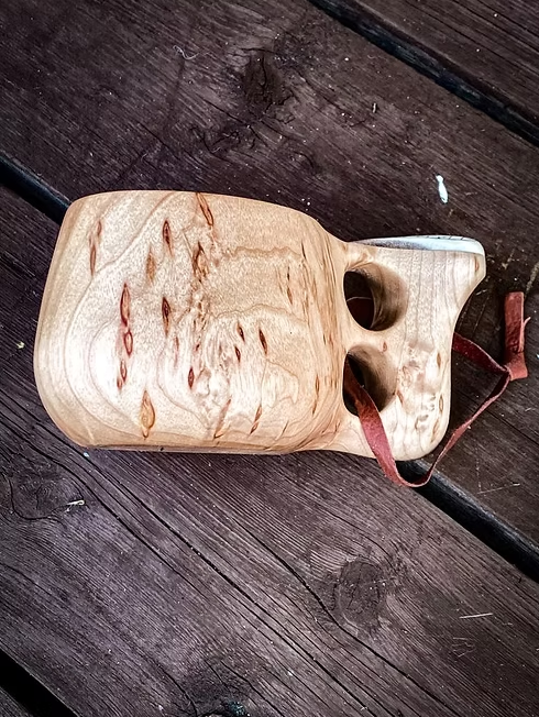 Kuksa cup with two fingered hand- engraved design handle